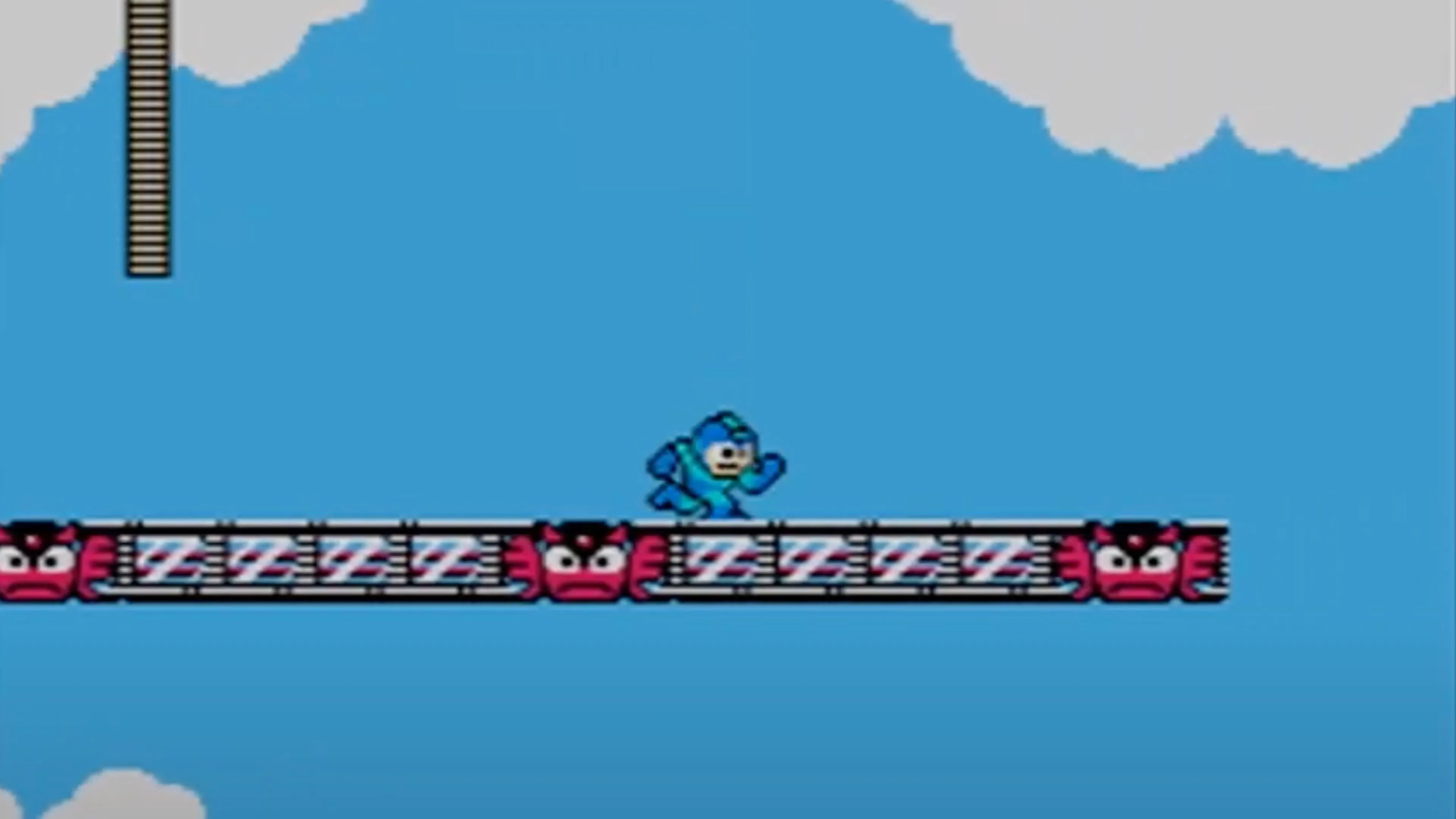 Cảnh chơi game Mega Man 2 với Mega Man đang di chuyển qua màn chơi của Heat Man.