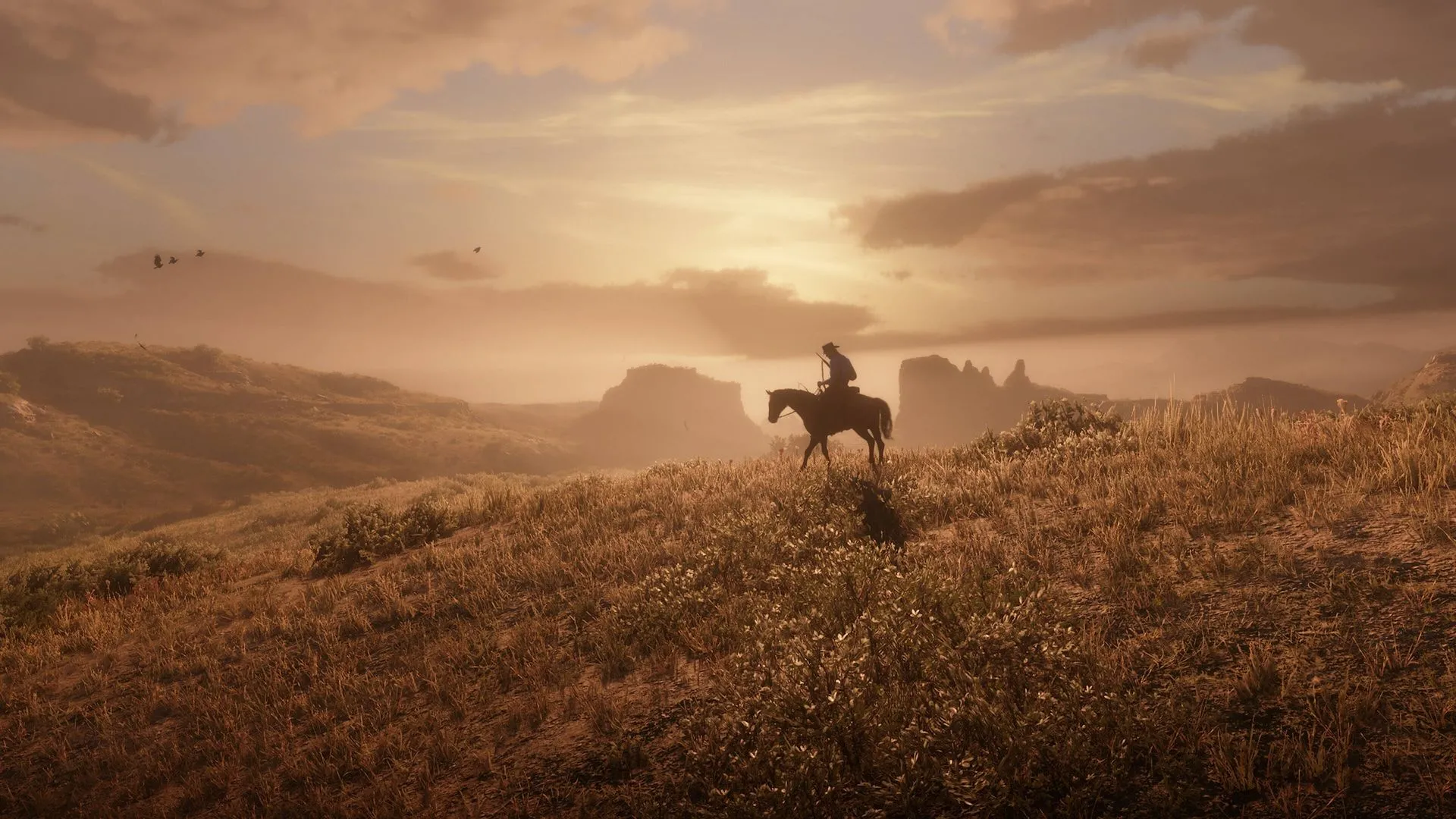 Cảnh hoàng hôn lãng mạn trong thế giới mở của tựa game AAA Red Dead Redemption 2