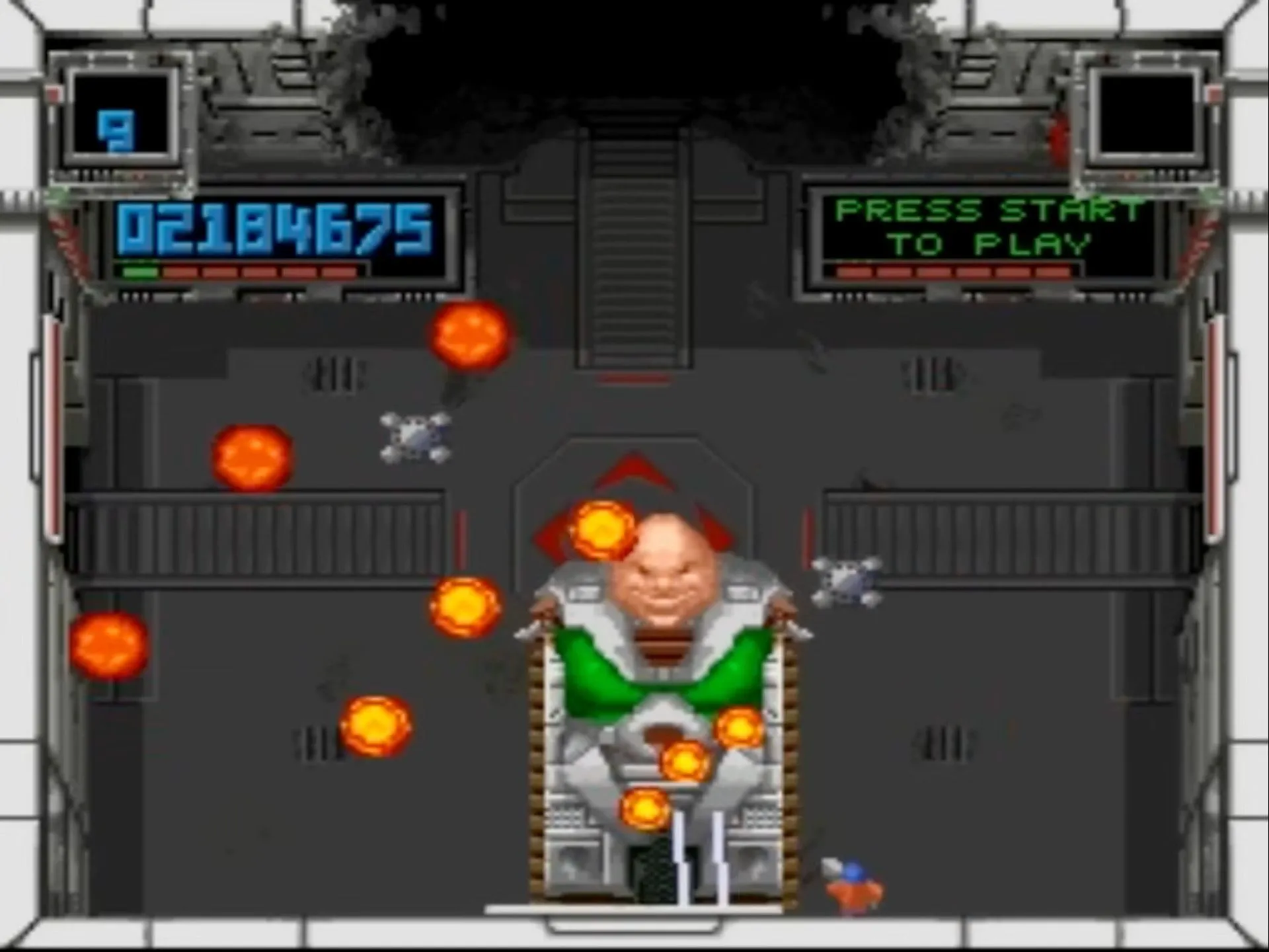 Giao diện màn hình game Super Smash TV trên SNES, một tựa game bắn súng hành động góc nhìn từ trên xuống.