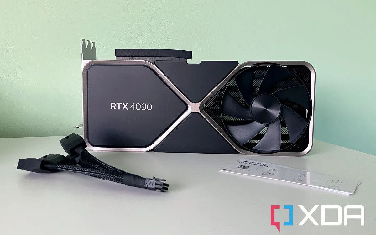 Hình ảnh cận cảnh card đồ họa NVIDIA GeForce RTX 4090 với các cáp nguồn được kết nối, minh họa kích thước và thiết kế của GPU hàng đầu