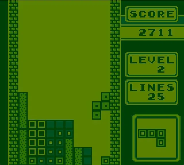 Màn hình chơi Tetris trên Game Boy hiển thị bảng chơi gần đầy và cần nhanh chóng xóa hàng.