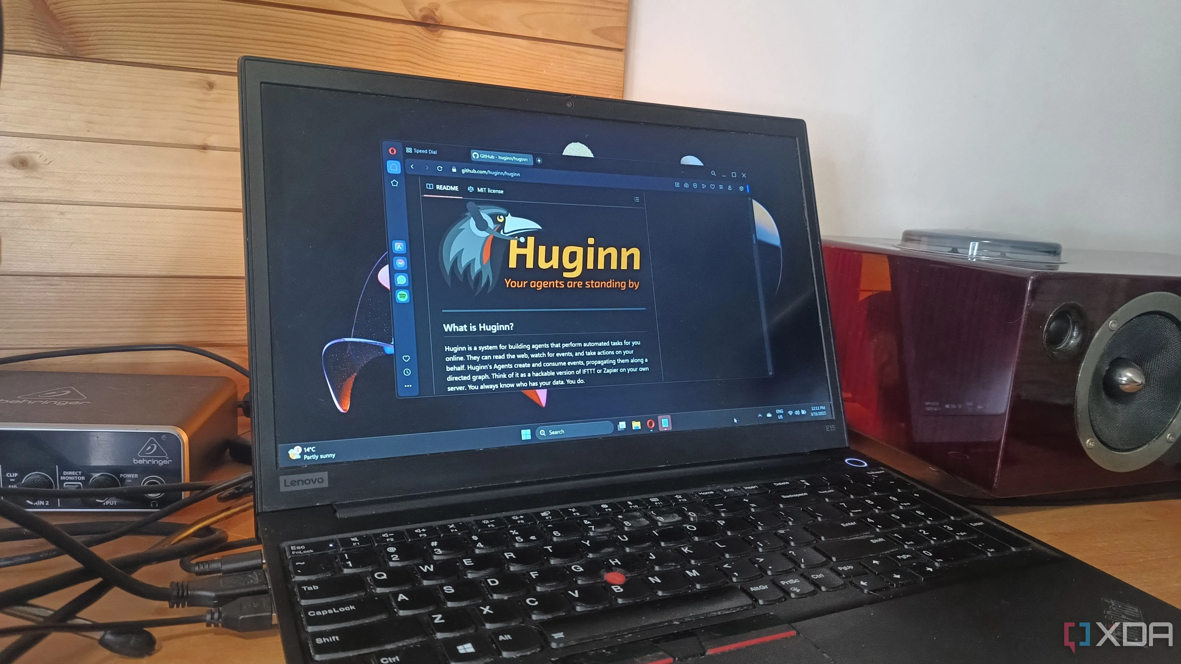Màn hình laptop hiển thị trang GitHub của Huginn