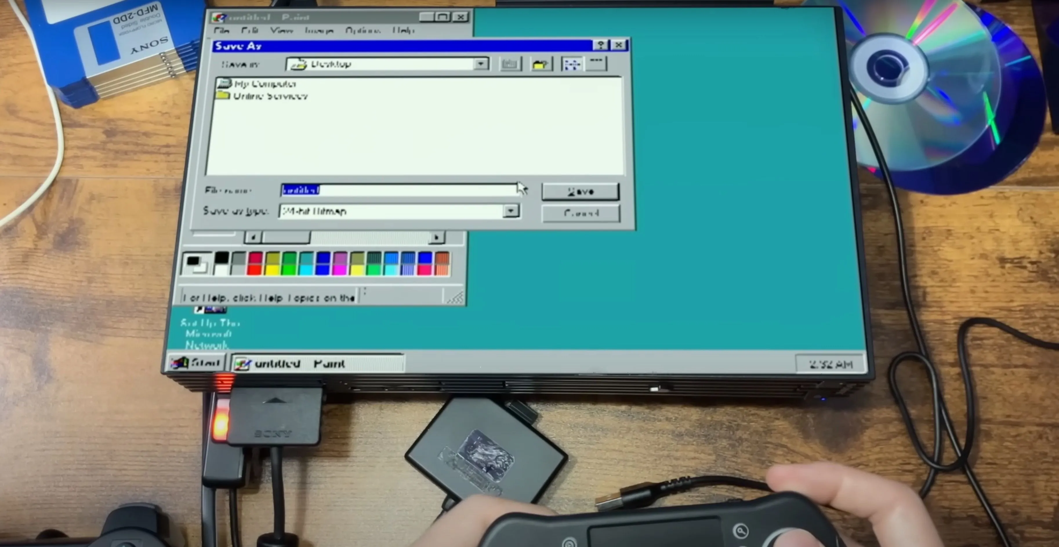 Màn hình Windows 95 hiển thị trên giao diện PlayStation 2, cho thấy dự án giả lập hệ điều hành cổ điển trên console game.